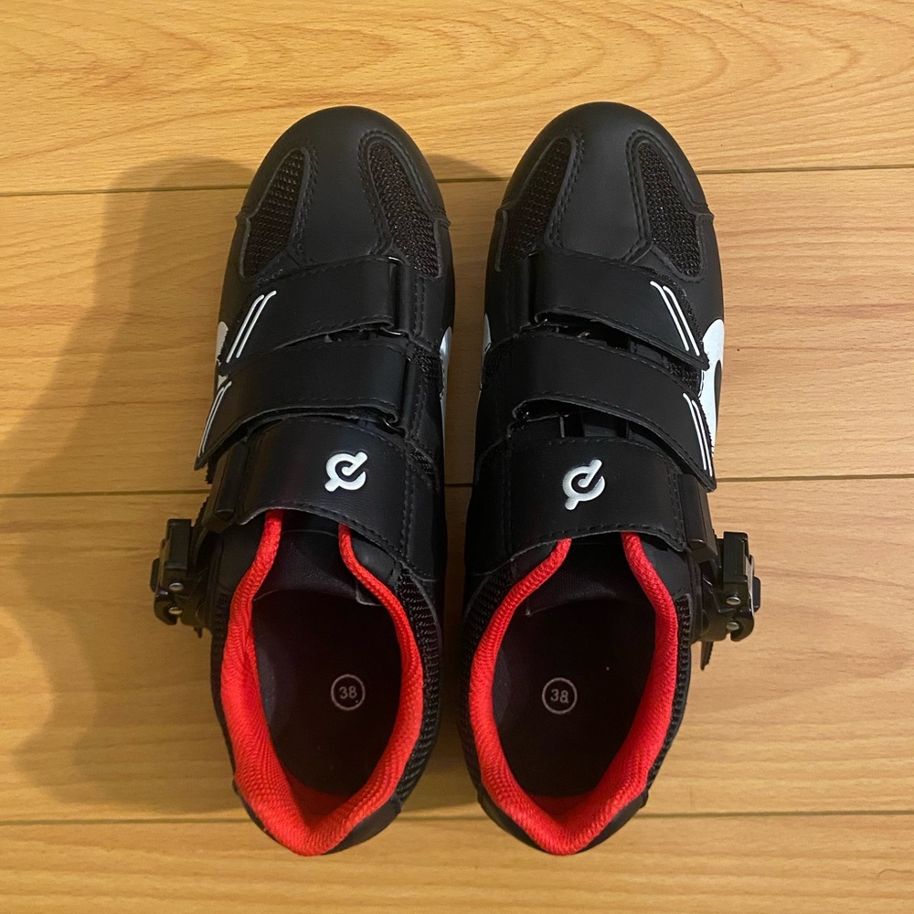 Black and red Peloton cycling shoes